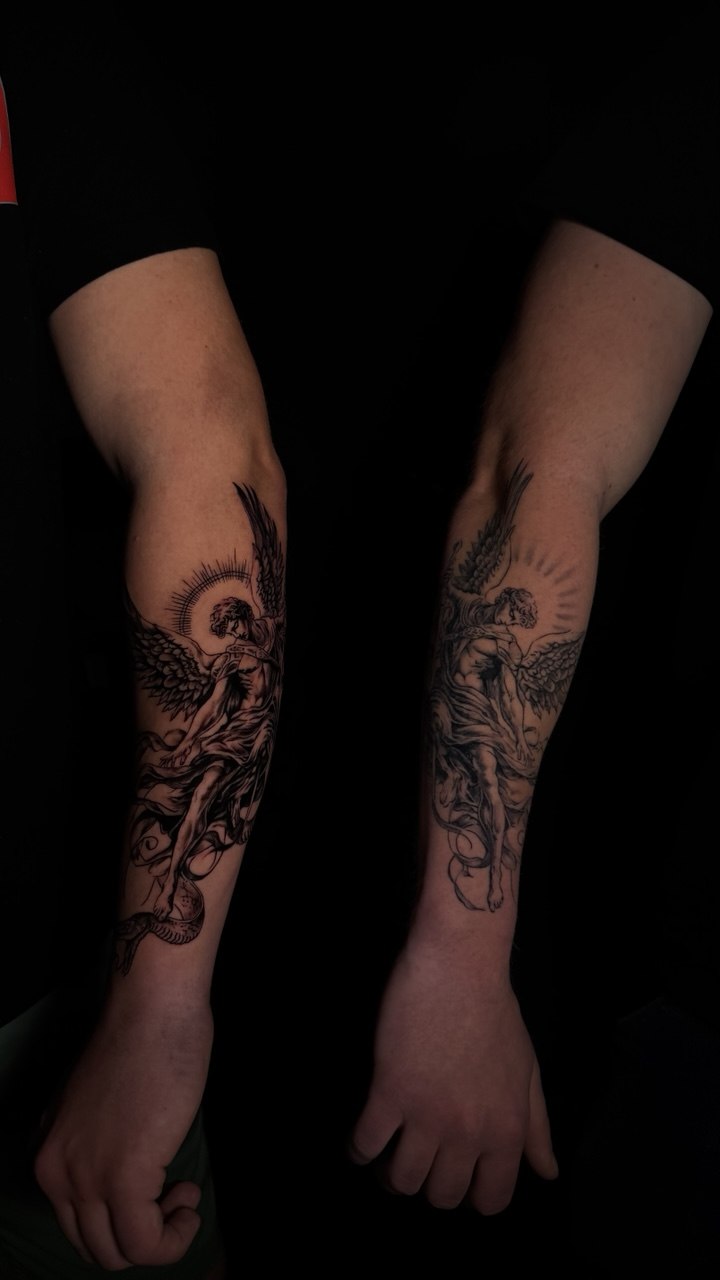 Matching angel tattoos on both forearms with detailed winged figures and delicate blackwork shading